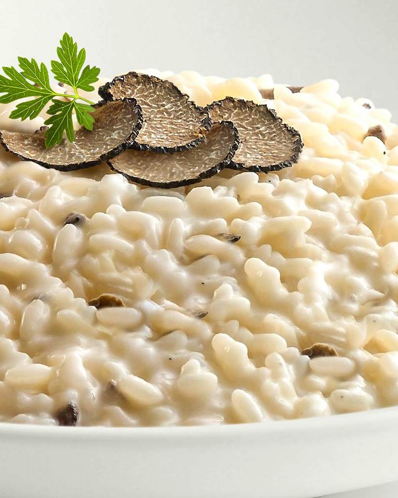 Risotto aux truffes noires Risotto mit schwarzem Trüffel