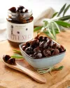 Olives noires dénoyautées dans de l'huile